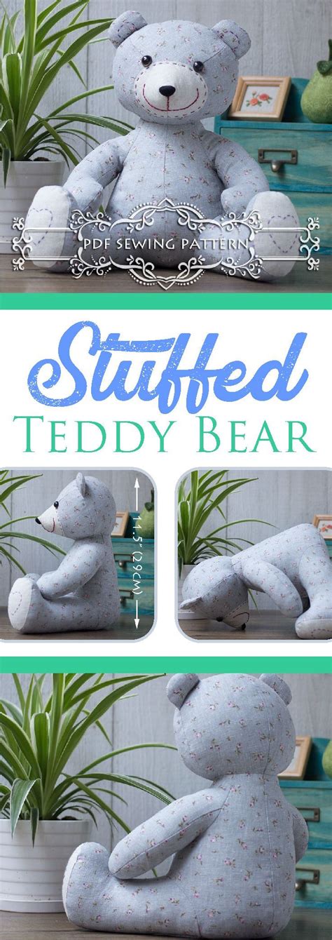 The Stuffed Teddy Bear Is Sitting Next To A Potted Plant