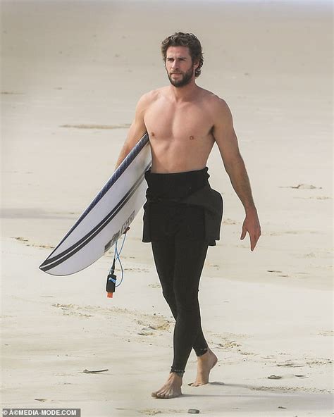 Chris And Liam Hemsworth Hit The Beach In Byron Bay With Bikini Clad