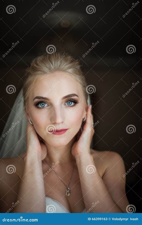 Beautiful Innocent Blonde Bride With Blue Eyes Posing Face Closeup
