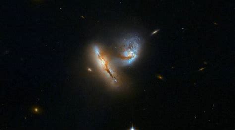 Wow See Two Galaxies Colliding As Seen By Nasas Hubble