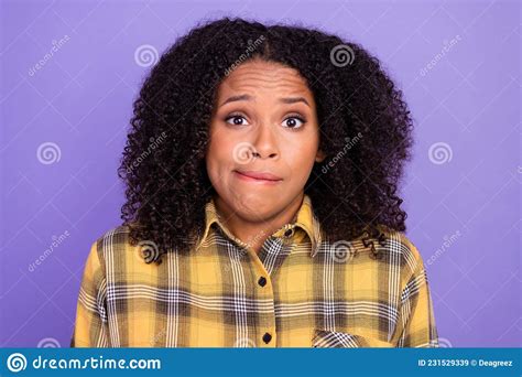 Photo Of Worried Unhappy Upset Dark Skin Woman Bite Lips Teeth Bad Mood Isolated On Purple Color