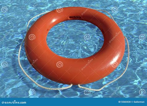 Life Ring Floating In Water Stock Photo Image 5560430