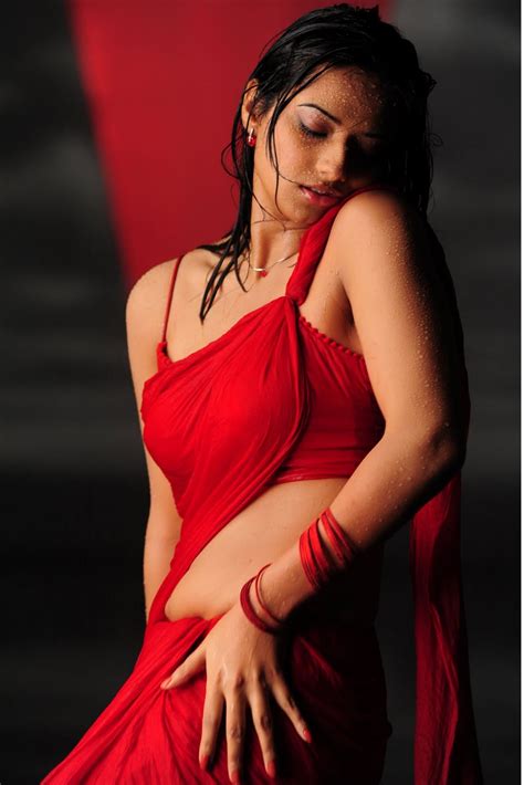 Isha Chawla Hot Navel Wet Saree Stills In Prema Kavali