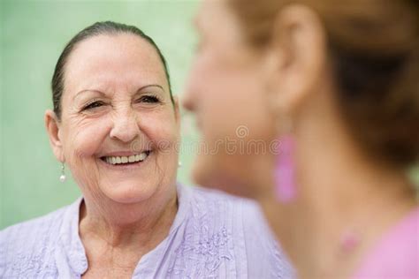 Two Elderly Women Talking On Park Bench Stock Photo Image Of Cheerful