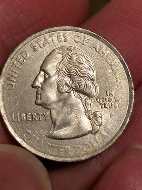 The rarest coin in my collection. A 2000 P state quarter entirely ...