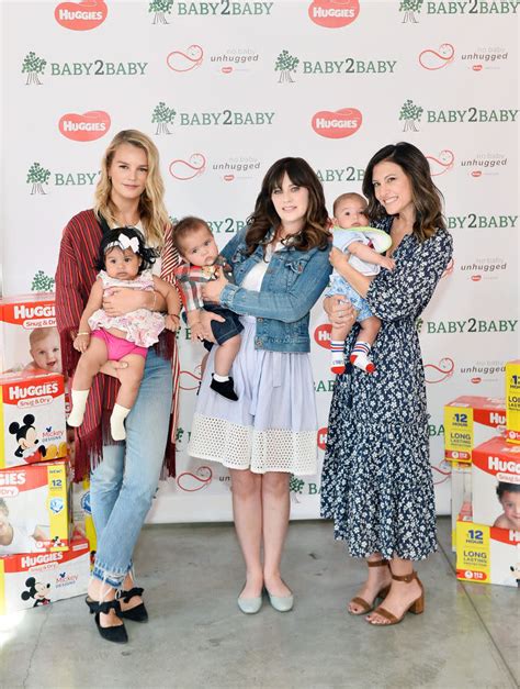 Zooey Deschanel Poses With A Cute Baby On The Red Carpet But Sorry