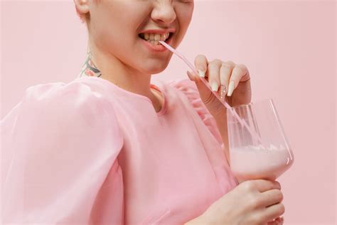 Person Drinking Strawberry Milkshake Photos By Canva