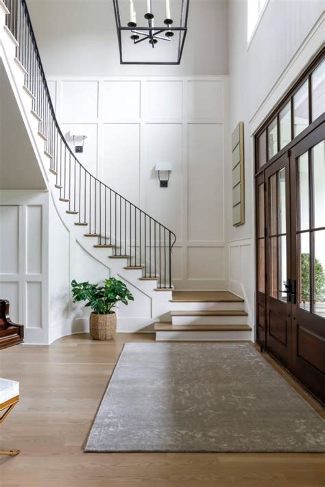White Transitional Foyer With Staircase Hgtv