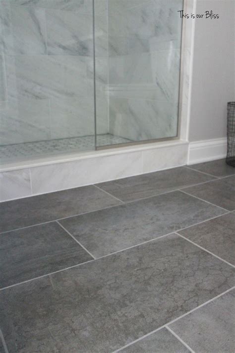 This warm gray tone of indonesian pebble tile is an exotic handmade stone mosaic. charcoal grey bathroom floor tiles | Grey bathroom floor ...