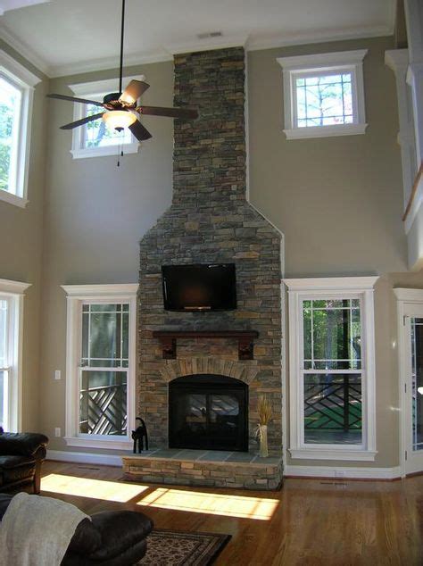 2 Story Stone Fireplace By Royalty Homes Inc Home Ideas Basement