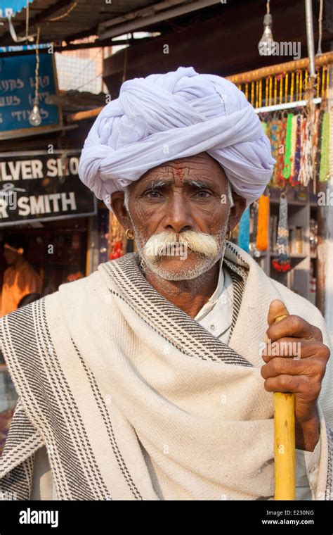 Old Indian Man With Traditional Rajasthani Turban In Pushkar Village In