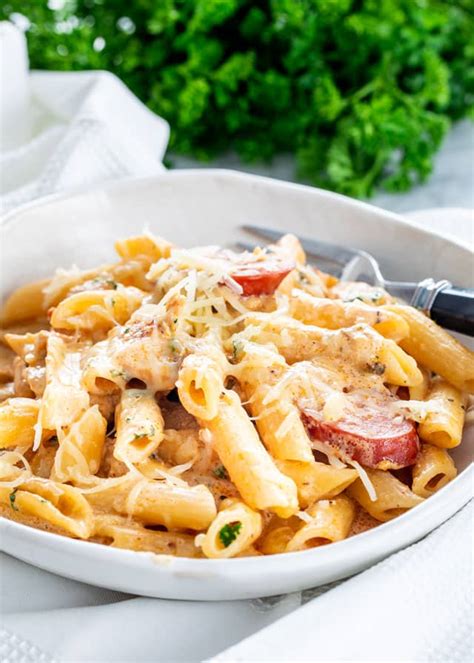 Slice the sausage into ½ inch rings. Cajun Chicken Pasta - Jo Cooks