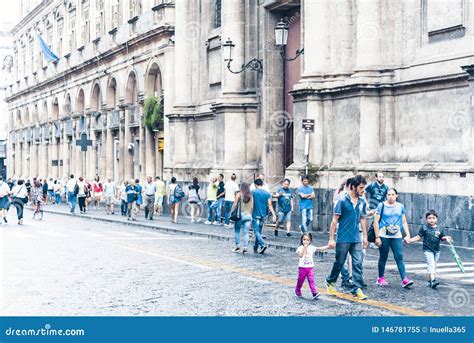 Catania Sicily â€ August 15 2018 People Walk On Historical Street