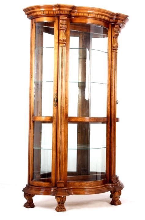 Our living room furniture category offers a great selection of curio cabinets and more. Carved Ornate Curved Glass Curio Cabinet w/