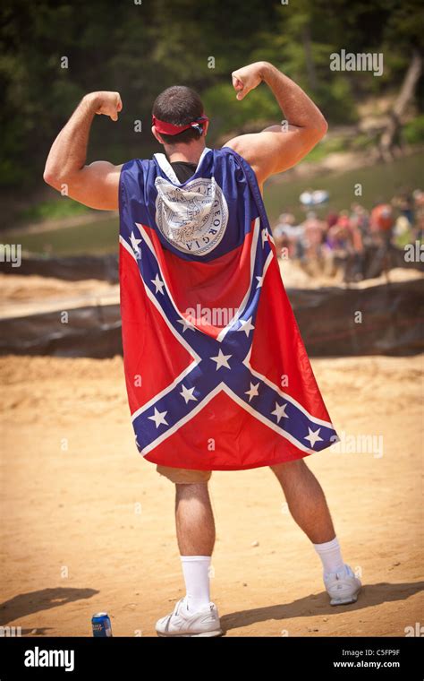 A Participant Wears A Confederate Georgia Flag During The Annual Summer