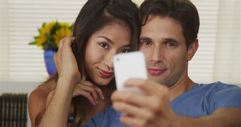 Happy Interracial Couple Taking Self Portraits Stock Footage Video 7210495 Shutterstock