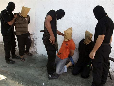 hamas death squads execute 18 zionist collaborators who allegedly helped israel locate