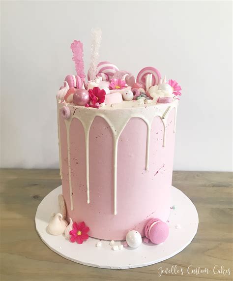 pink drip cake by jenelle s custom cakes