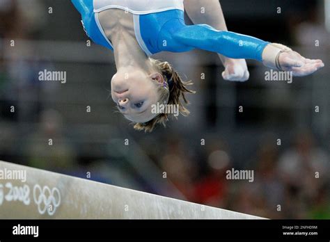 russia s gymnast ksenia semenova performs on the balance beam during the womens gymnastics