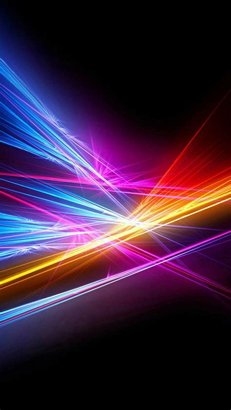 An Image Of Colorful Lines In The Dark