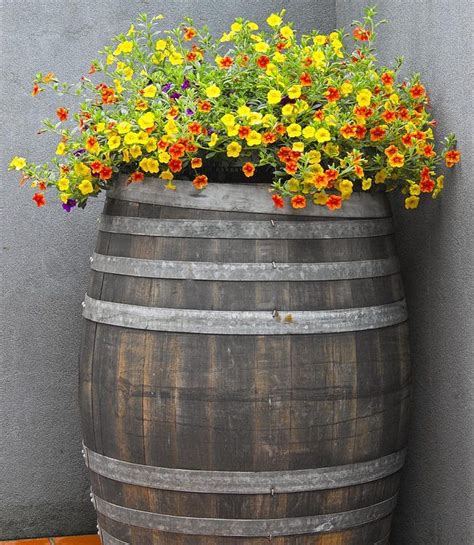 Impressive Diy Wine Barrel Planters That You Can Make In No Time