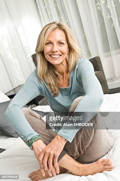 Mature Barefoot Women Relaxing Photos And Premium High Res Pictures