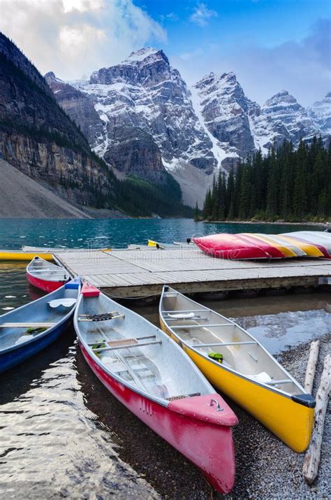 Colorful Canoes Docked At Moraine Lake Stock Photo Image Of Color