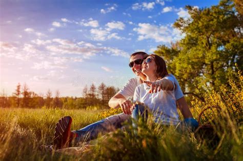 Couple Having Good Time Laughing And Enjoying Nature Outside Woman And