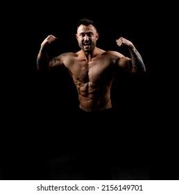 Strong Male Bodybuilder Naked Torso Shows Foto Stock