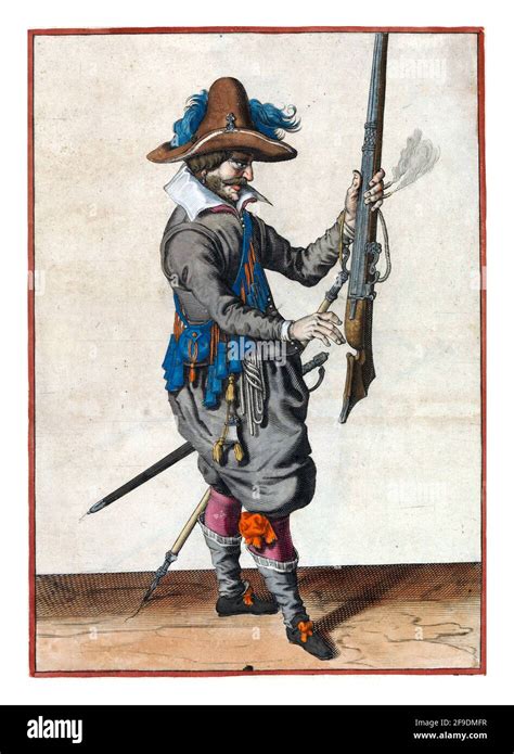 A Soldier Full Length To The Right Holding A Musket A Type Of Firearm With His Left Hand