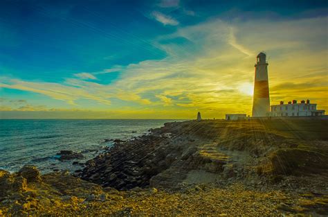 Free Images Sea Coast Ocean Horizon Cloud Lighthouse Sunrise