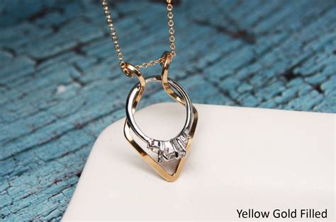 Tiffany 1837®:makers slice ring in yellow gold. Image result for designs for widow wedding ring necklace ...