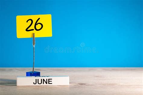 June 26th Day 26 Of Month Calendar On Yellow Background With Office