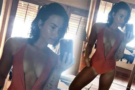 Demi Lovato Takes The Plunge In Sexy Orange Swimsuit As She Shows Off Enviable Bikini Body Yet