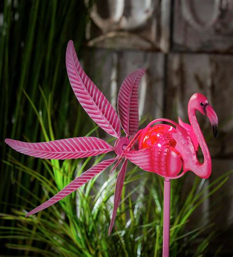 Check out our garden wind spinner selection for the very best in unique or custom, handmade pieces from our garden decoration shops. Solar Flamingo Metal Wind Spinner with Glass Orb | All ...