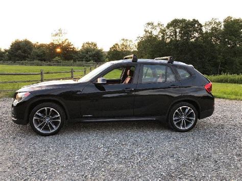 The m sport package stiffens the. 2013 Bmw X1 XDrive Sport Package Black on Red Pano Roof | Voitures et motos