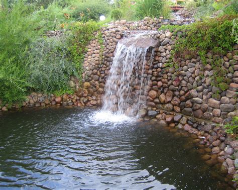 Our swimming pool waterfalls perfect for the do it yourself people to lift move and install while being a real hit for the contractor. Diy Outdoor Pond Waterfall | Pool Design Ideas