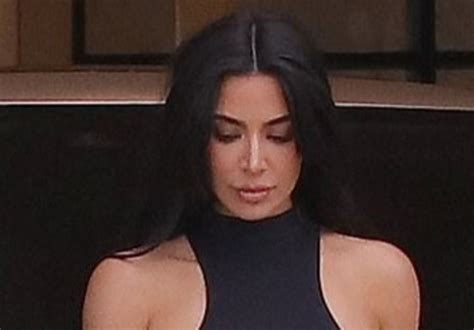 watch kim kardashian flaunt her msssive booty in a pair of figure hugging jeans in latest thirst