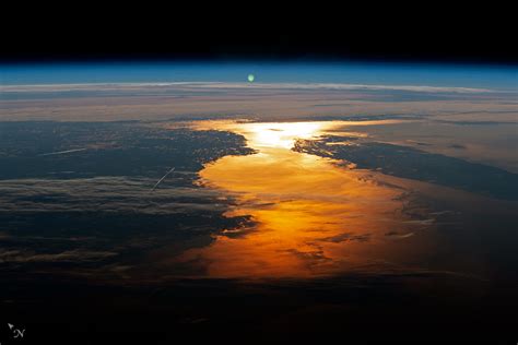 A Sunrise From The International Space Station •