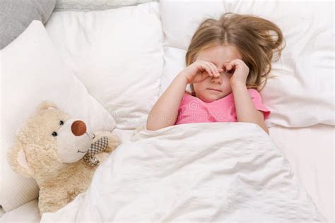 Little Child Girl Wakes Up From Sleep Stock Image Image Of Adorable