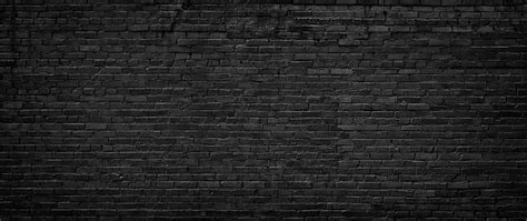 Black Brick Wall Texture Of Dark Brickwork Closeup Stock Photo