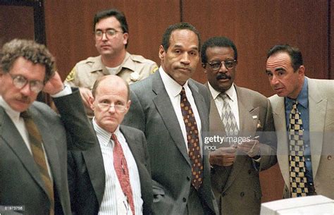 Oj Simpson Along With His Defense Team Stands As The Jury Enters