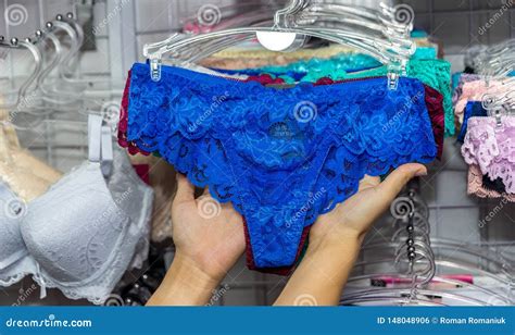 Female Hands With Panties In Underwear Shop Stock Photo Image Of