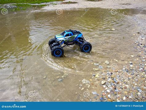 Rc Auto Model Rides Through The Water Stock Photo Image Of Drive