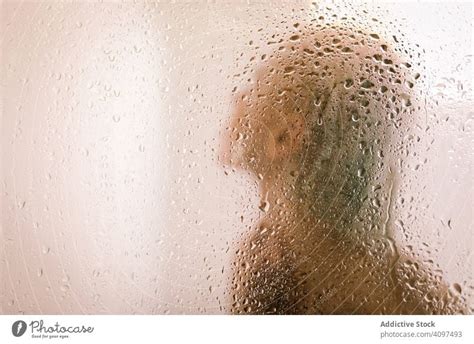 Woman Behind Wet Glass In Shower A Royalty Free Stock Photo From Photocase