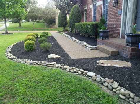 Discover new landscape designs and ideas to boost your home's curb appeal. Decorative Landscaping with Rocks for a Natural House ...