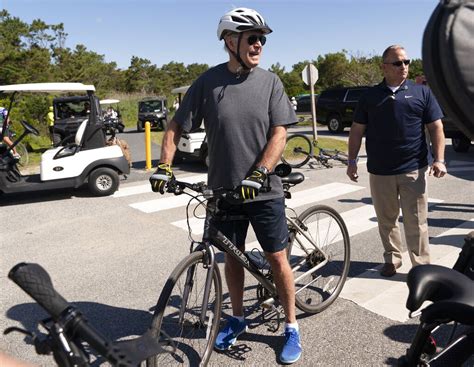 Watch President Joe Biden ‘get Foot Caught Fall Off Bike Near Beach Home As Crowd Swarms