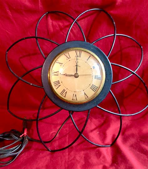 Alba Vintage Starburst Electric Metal Wall Clock