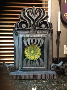 The clock appears in the corridor of doors with its face glowing green, and its crooked hands moving backwards past the number 13 in the place of 12. Haunted Mansion Home Decorating on Pinterest | Haunted ...
