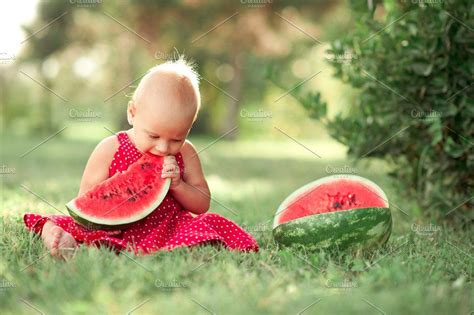 Baby Eating Watermelon Stock Photo Containing Closeup And Meadow Baby